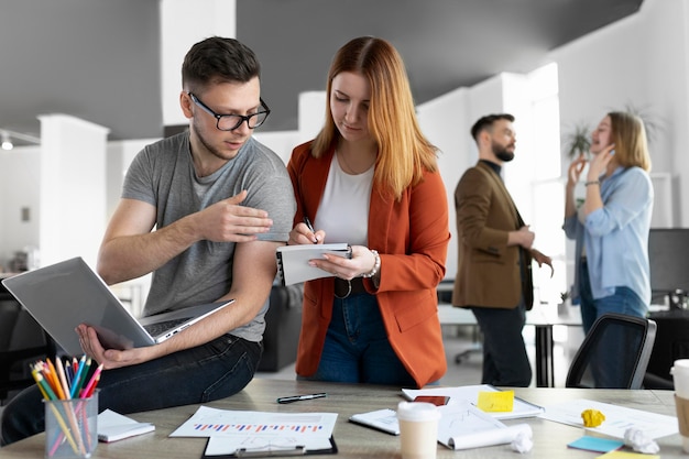 Young people having a work meeting at the office