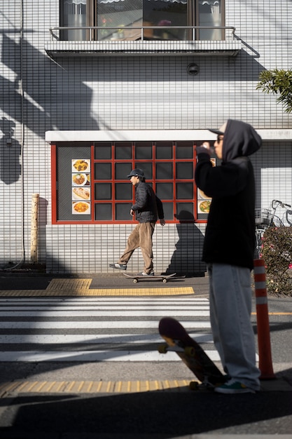 Young people skateboarding in japan