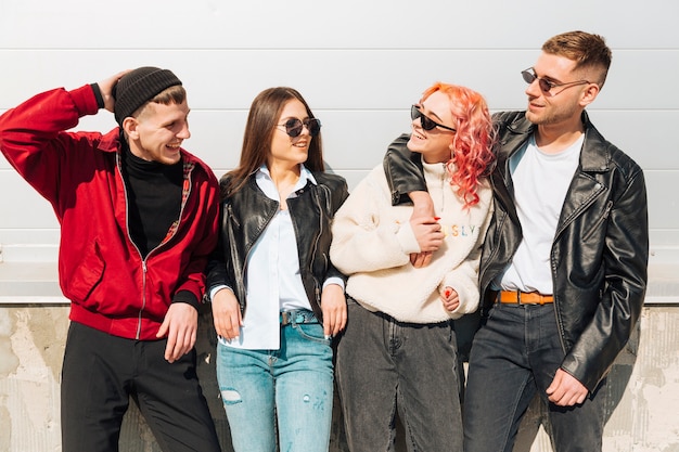 Young people smiling and looking at each other