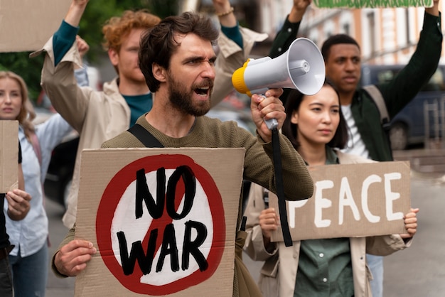 Young people taking part of anti war protest