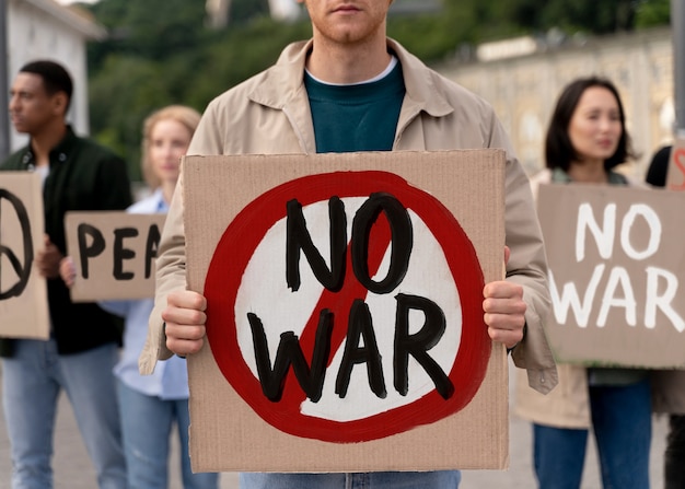 Young people taking part of anti war protest