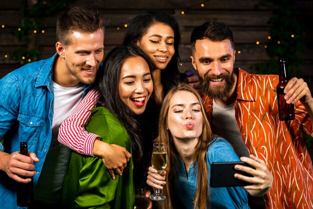 Young people taking a selfie together