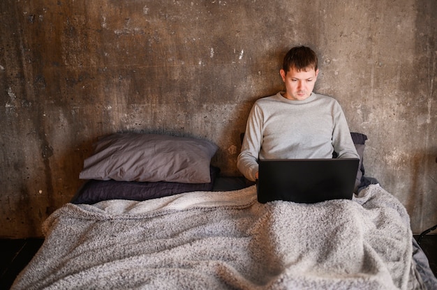 Young professional man working from home