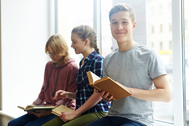 Free photo young readers at the university