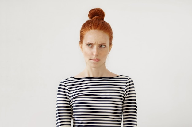 Free photo young redhead woman posing