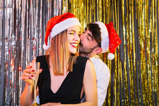 Young romantic couple celebrating new year