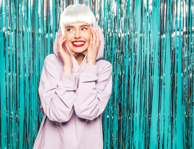 Free photo young sexy smiling hipster girl in white wig and red lips.beautiful trendy woman in summer clothes. going crazy