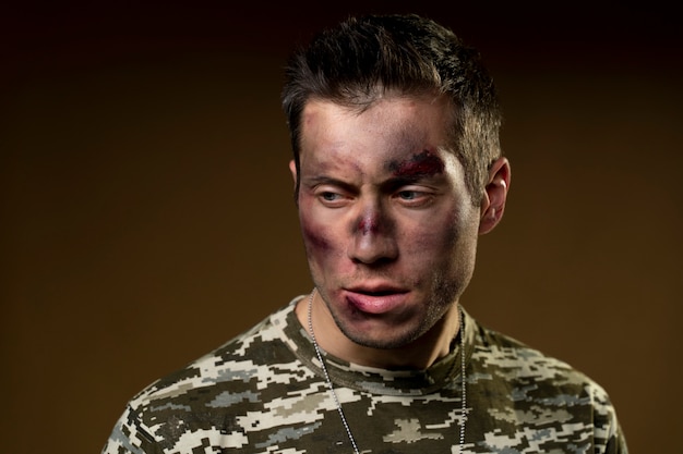 Free photo young soldier affected by ptsd effect