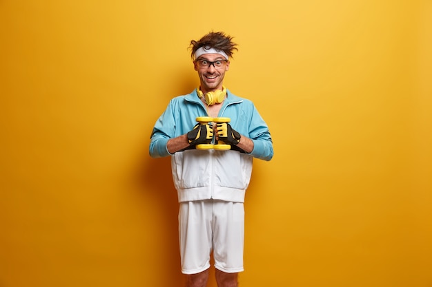 Free Photo young sportsman getting ready for his training isolated