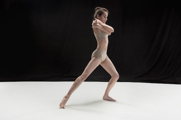 Free Photo young teen dancer on white floor.