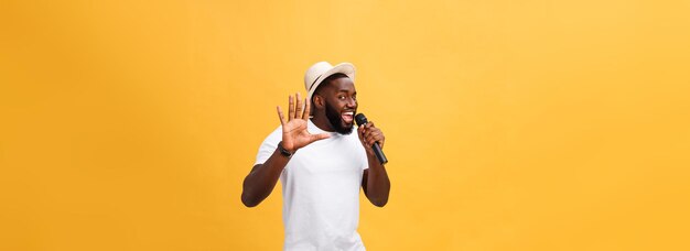 Young teenage black african american boy singer performing at a concert