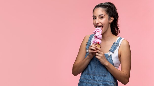 Young teenage girl eating an ice cream