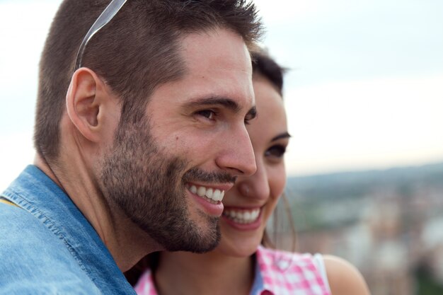 Young tourist couple looking at the views in the city.