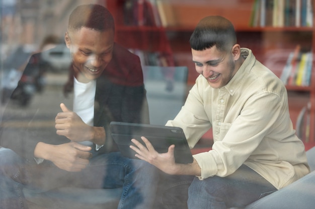 Free Photo young trans man working at business center