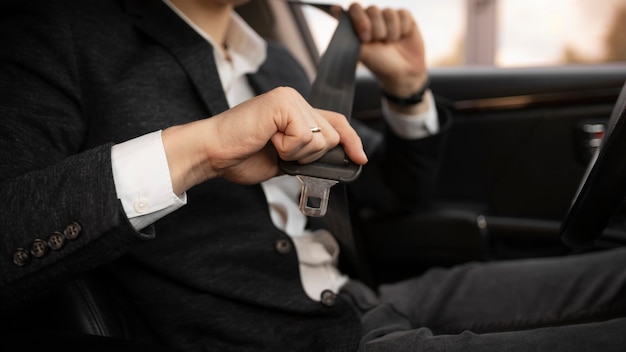 Young uber driver in car interior