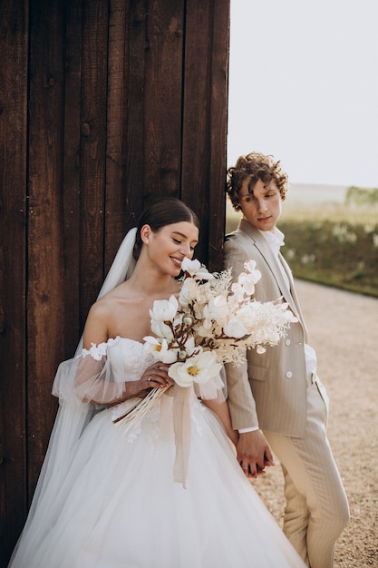 Free photo young wedding couple on their wedding