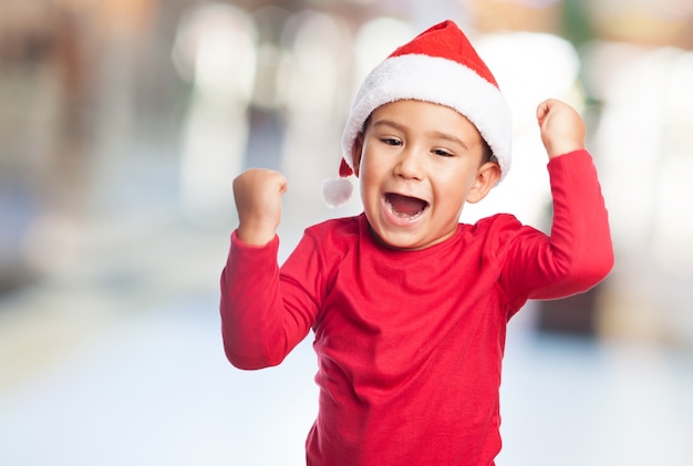 Young winner with santa claus hat