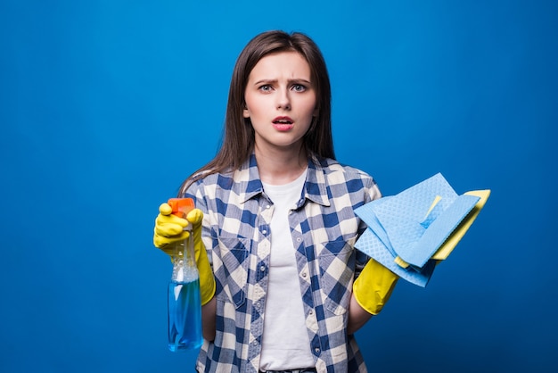 Free photo young woman in apron isolated. cleaning concept