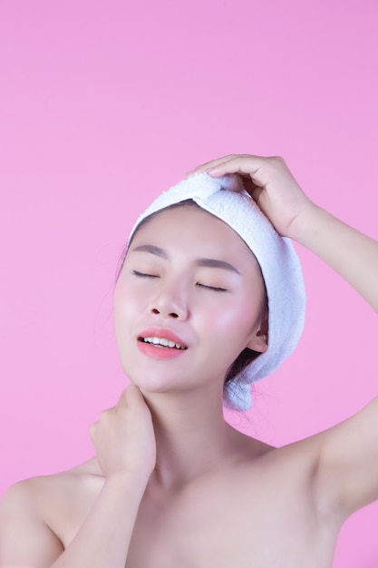 Young woman asia with clean fresh skin touch own face, Expressive facial expressions, Cosmetology and Spa.