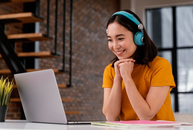 Young woman attending online class