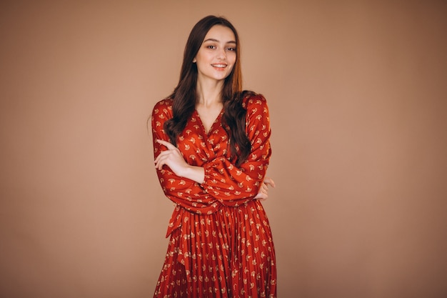 Young woman in a beautiful red dress