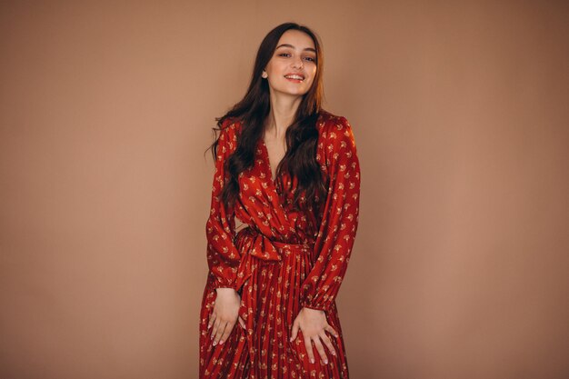 Young woman in a beautiful red dress