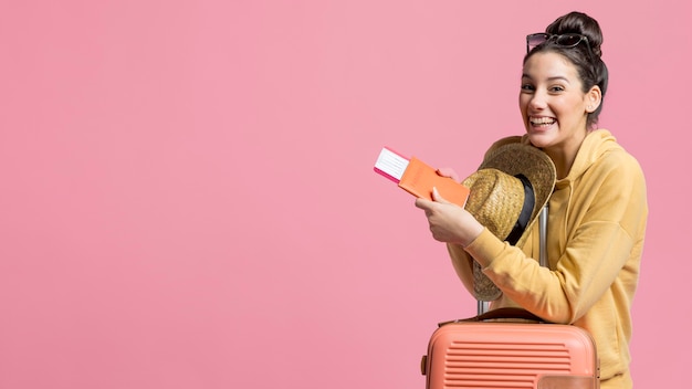 Young woman being happy about a new trip