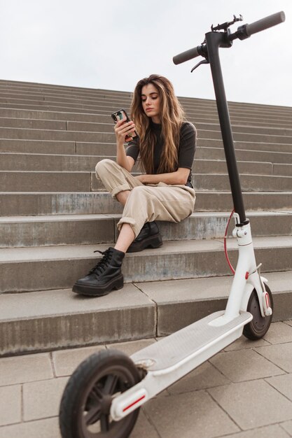 Young woman browsing her mobile phone