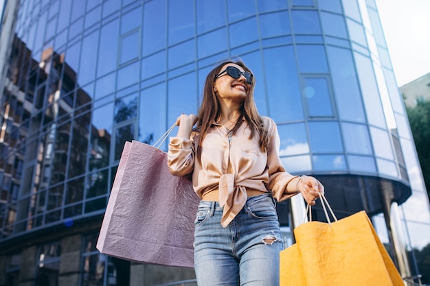 Young woman by the shopping center