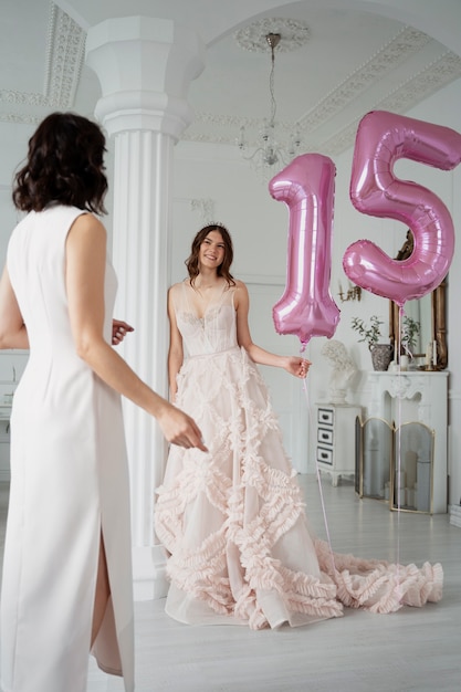 Free photo young woman celebrating her quinceanera