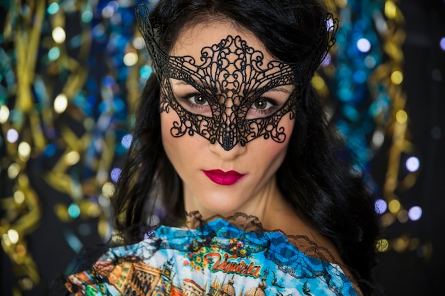 Free Photo young woman celebrating venetian carnival