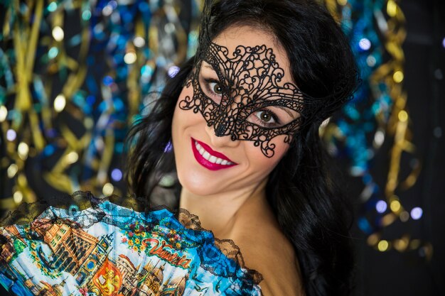 Free Photo young woman celebrating venetian carnival