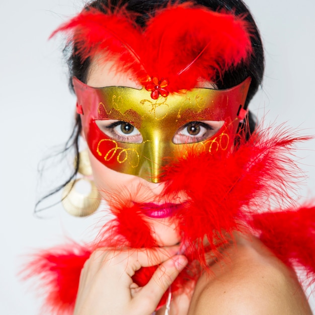 Young woman celebrating venetian carnival