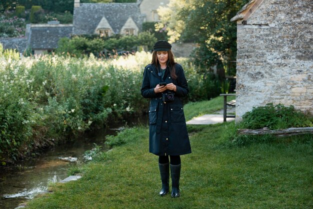 Young woman checking her phone while traveling