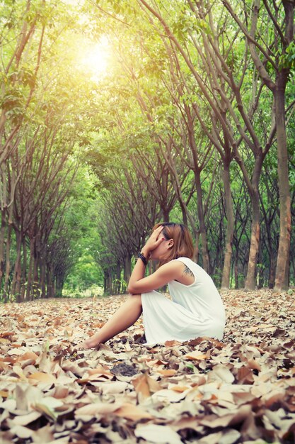 Young woman crying outdoors