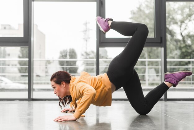 Young woman dancing hip hop