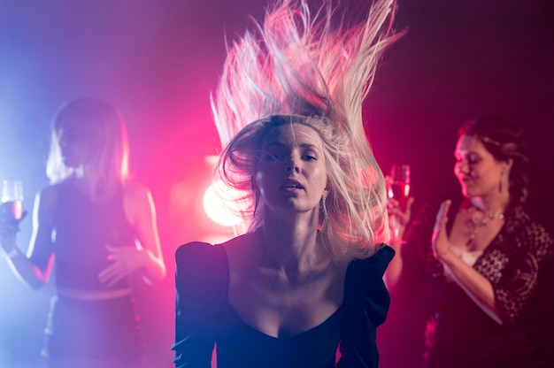 Free photo young woman dancing