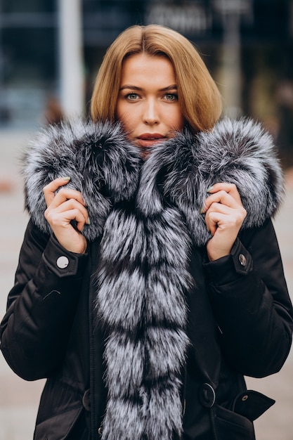 Free Photo young woman demonstrating upper cloths