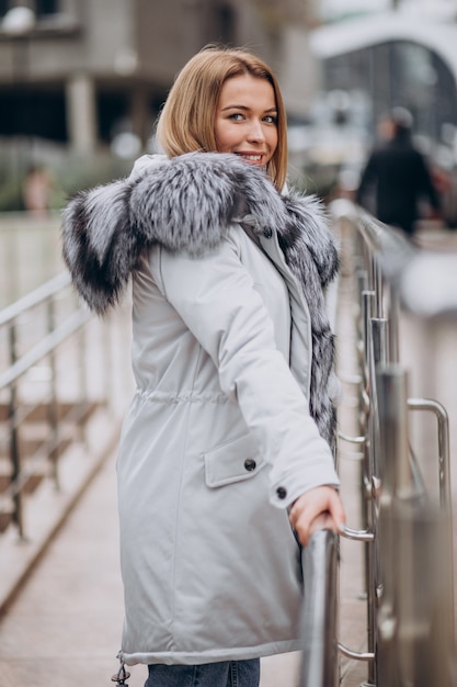 Free Photo young woman demonstrating upper cloths