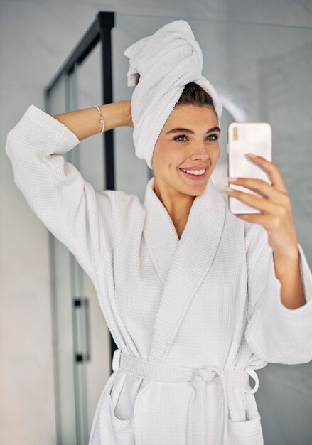 Young woman doing a beauty live with her phone