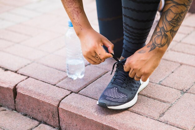 Young woman doing exercise in the park