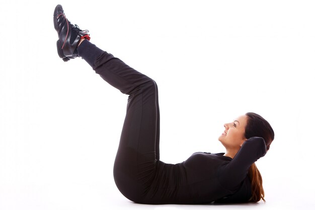 Young woman doing fitness exercises