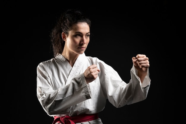 Young woman doing karate