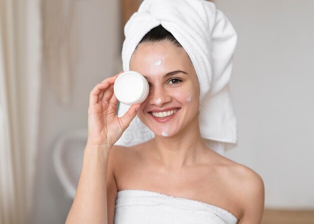 Young woman doing a self care routine at home