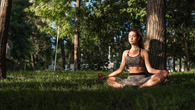 Young woman doing sport in the park