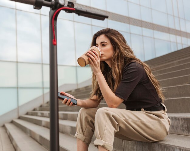 Young woman enjoying a coffee