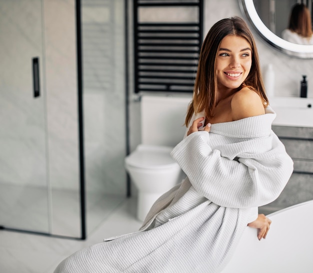 Free photo young woman enjoying her morning routine