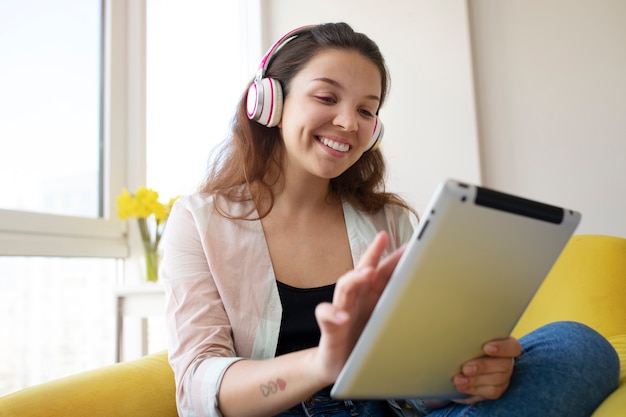 Young woman enjoying listening to music