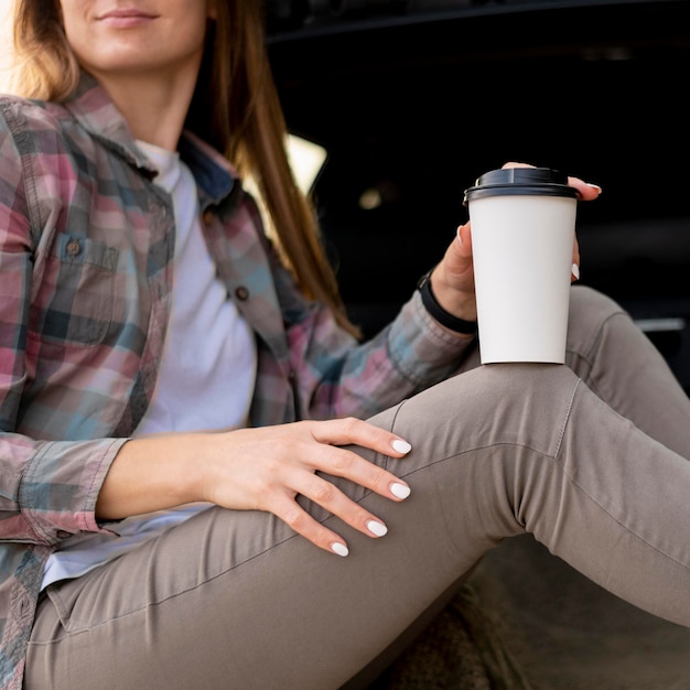 Free photo young woman enjoying road trip