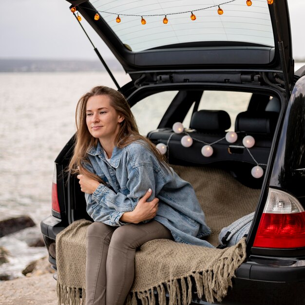 Young woman enjoying road trip